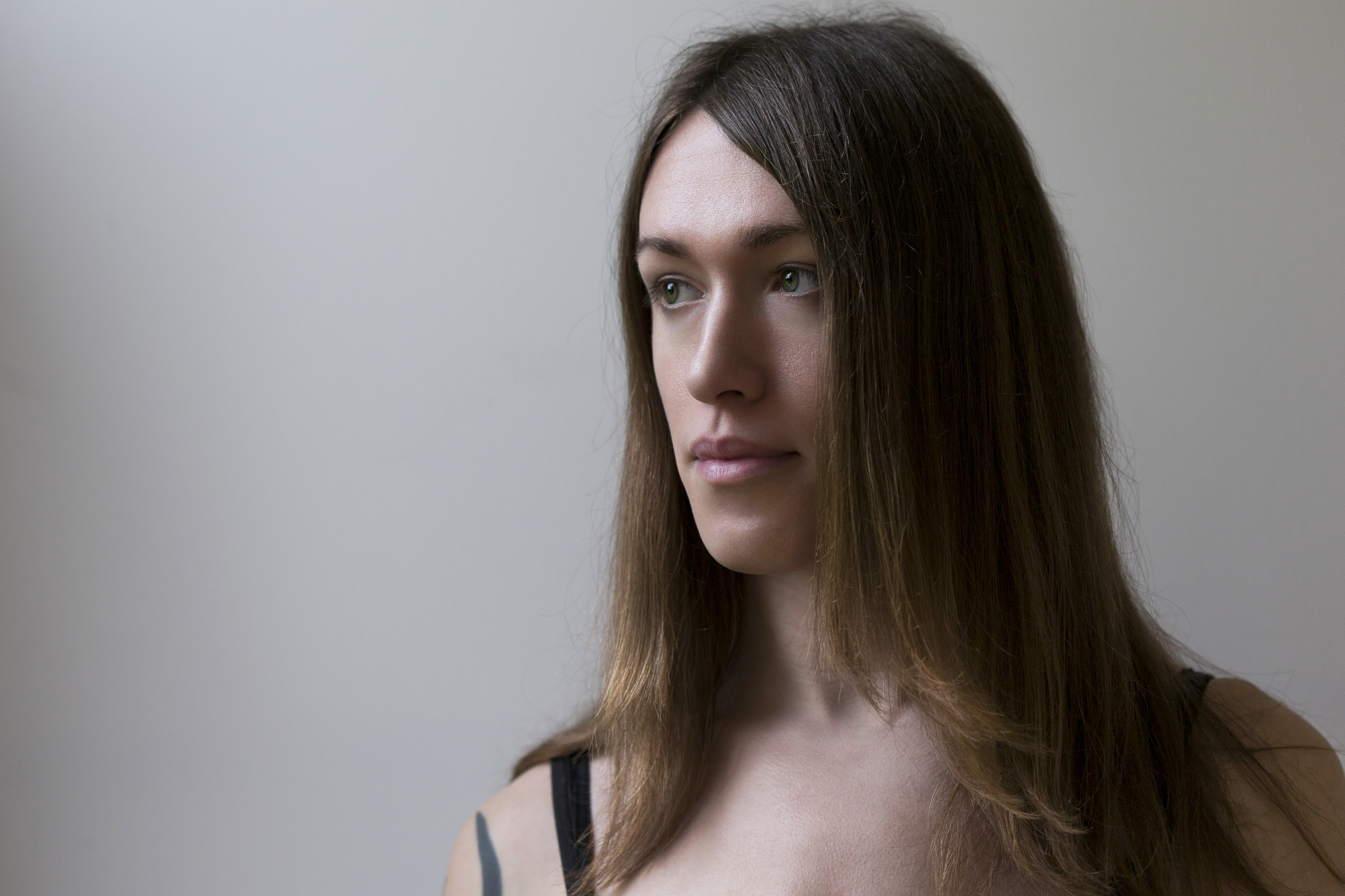 Trans patient - woman with long brown hair